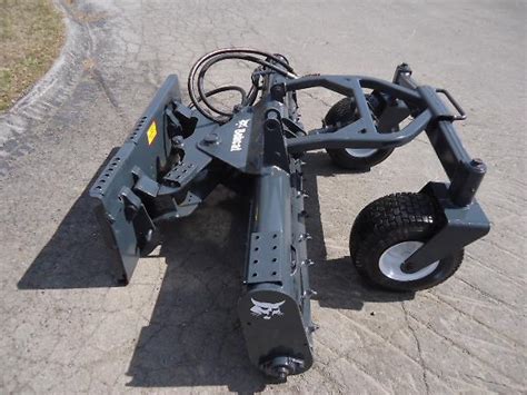 mini skid steer harley rake rock bed|bobcat harley rake attachment.